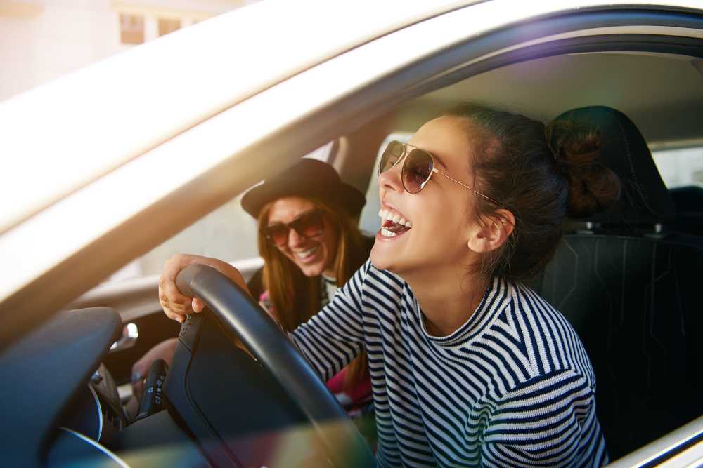 Two young women heading for convenient dinning and shopping options close to Deer Meadow Village in Columbia, South Carolina