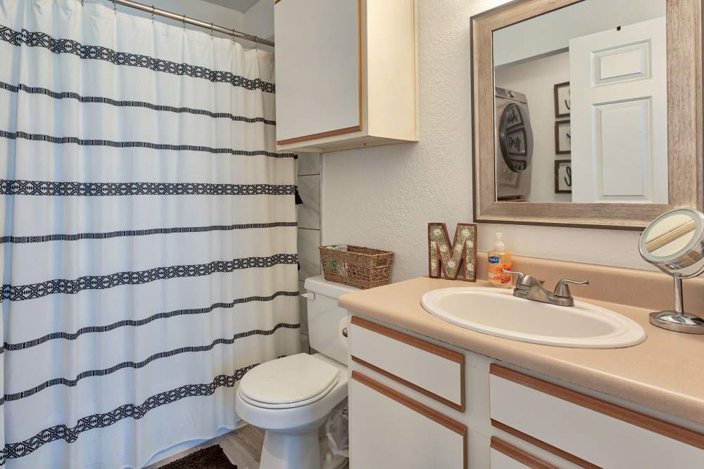 Bathroom with large at The Gardens At Duncan Apartments in Duncan, Oklahoma