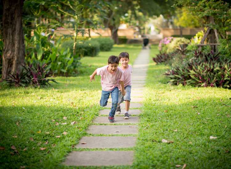Resident kids playing in the park near at Hyde Square Coop in Jamaica Plain, Massachusetts
