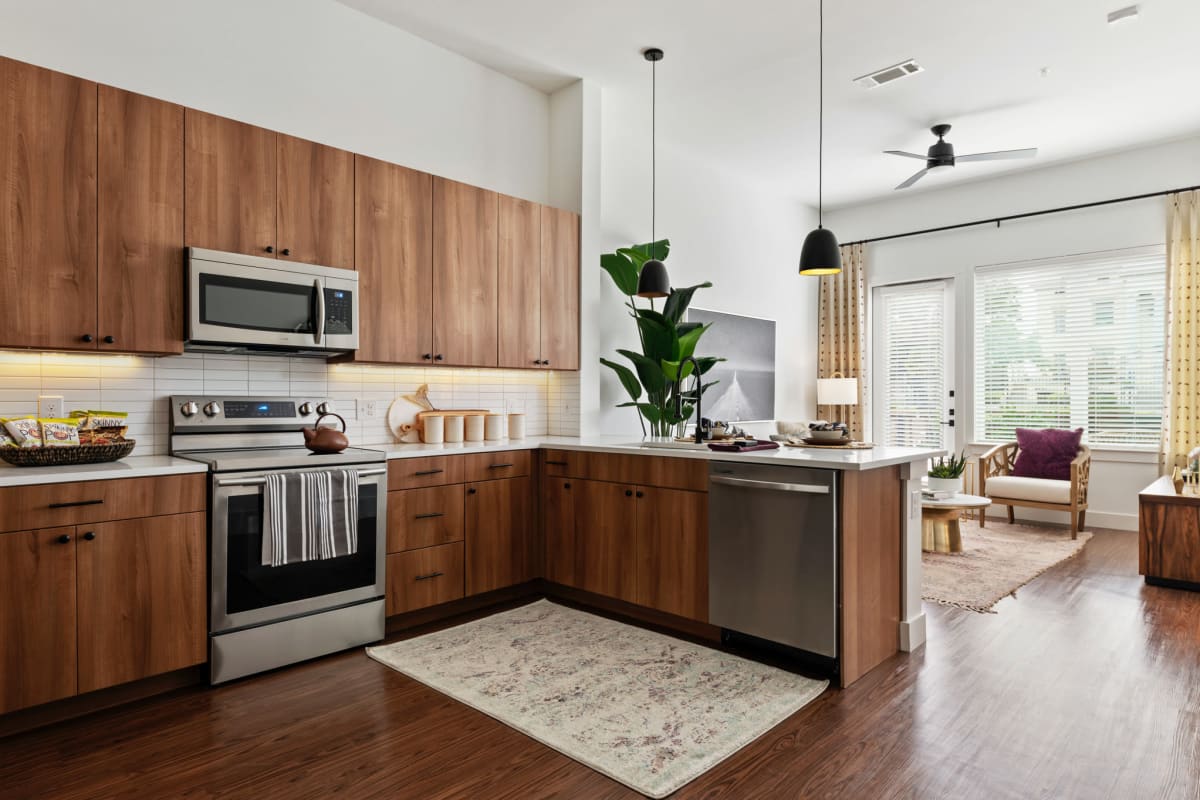 Kitchen with stainless-steel appliances at 4600 Ross in Dallas, Texas