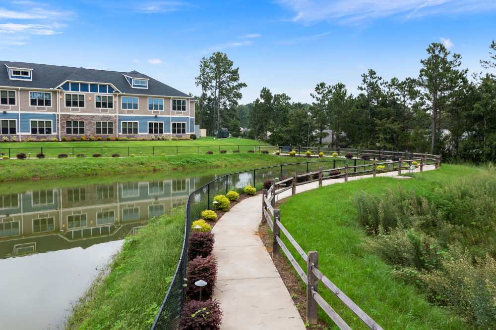 Community with pond with walking trail at The Barclay at Whiskey Road in Aiken, South Carolina