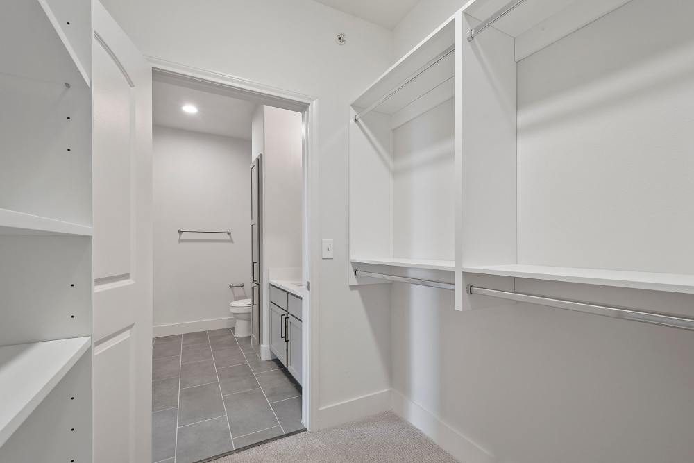 Closet connected to bathroom at Trinity Bluff & Trinity District in Fort Worth, Texas