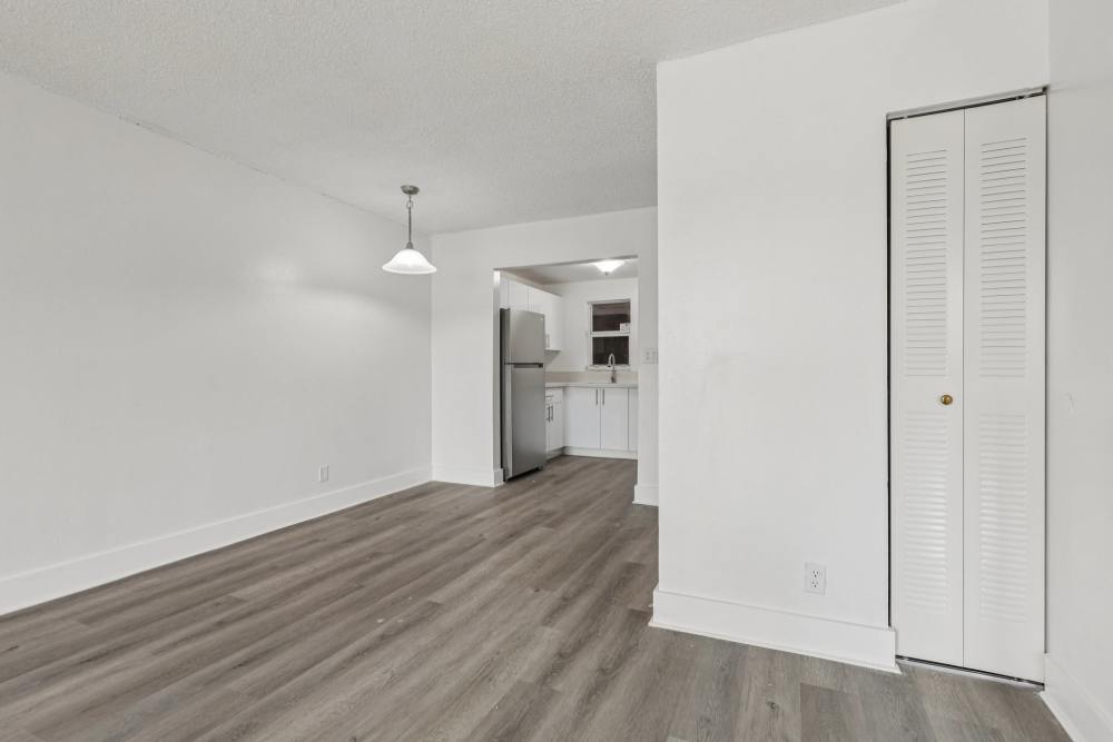 Spacious apartment with hardwood flooring at El Jardin Apartments in Hollywood, Florida