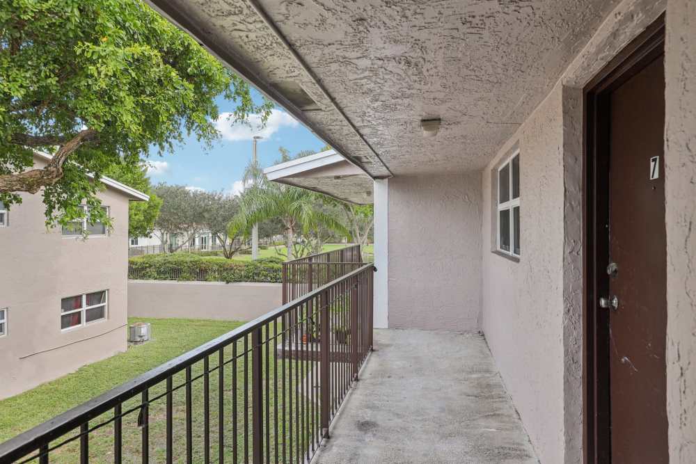 Private balcony view of apartments at El Jardin Apartments in Hollywood, Florida