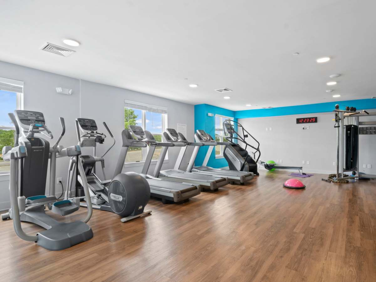 Fitness center with treadmills and other equipment at The Rise at Regency in Henrico, Virginia