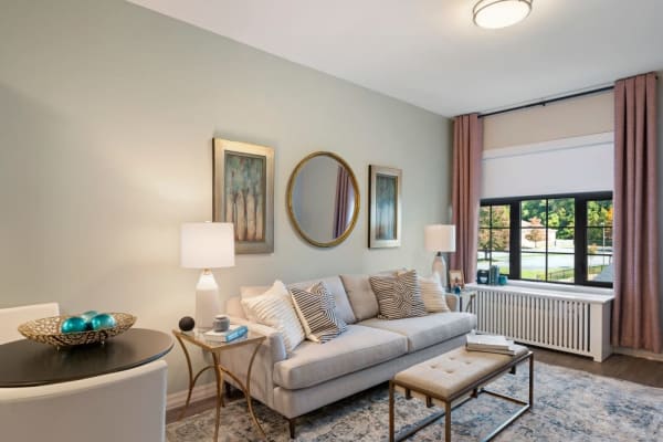 A living room in an apartment at Anthology of Tuckahoe in Henrico, Virginia
