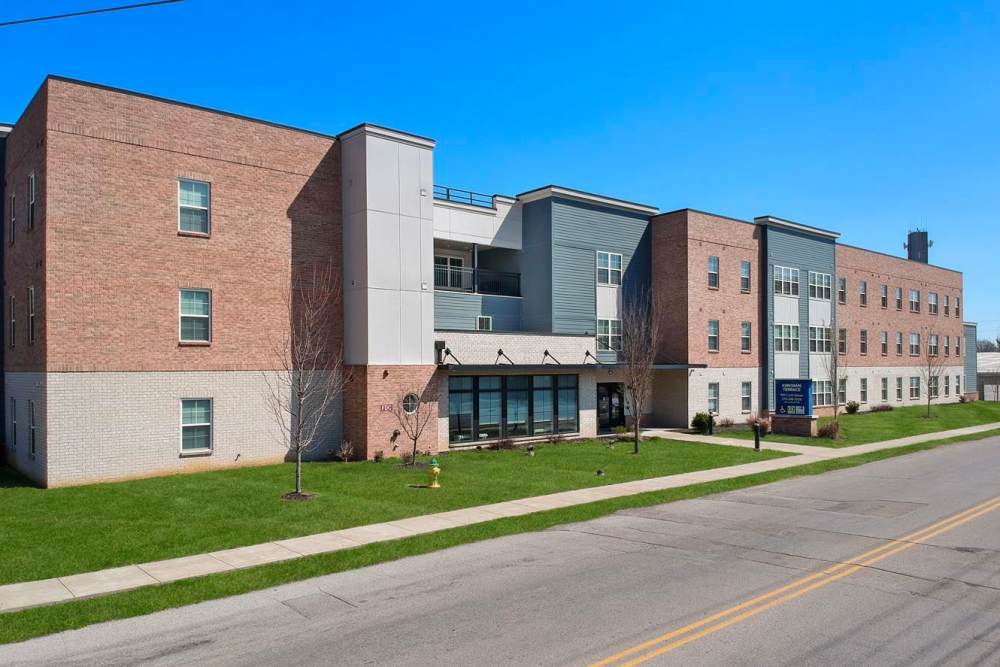 Modern apartment community with landscaped grounds and a welcoming entrance at Kirkman Terrace in Hopkinsville, Kentucky