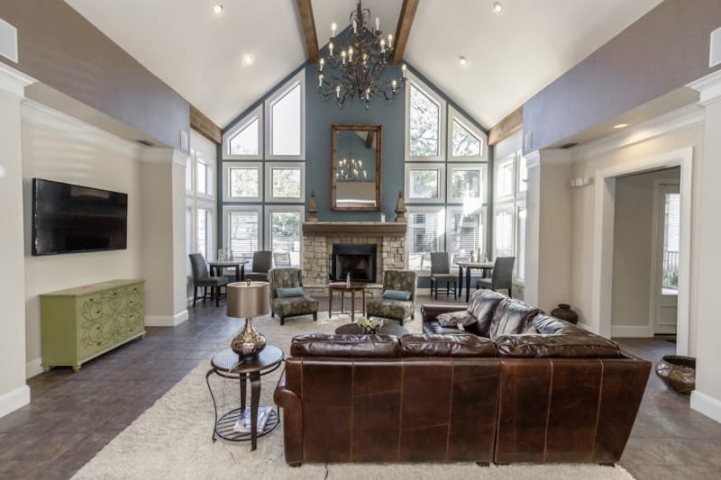 Resident clubhouse with TV at The Aidan in Lewisville, Texas