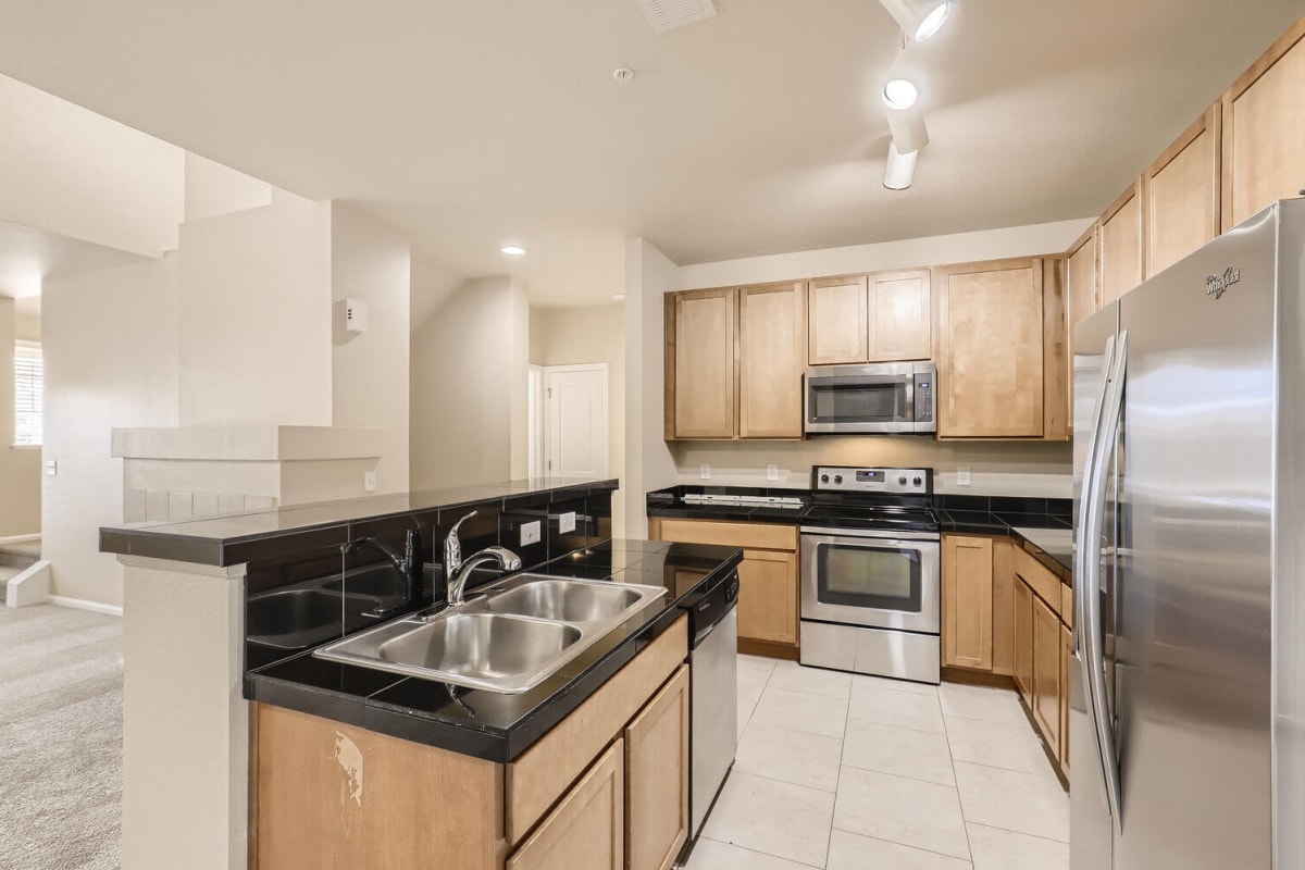 Stainless-steel appliances in a townhome at Maple Leaf Townhomes in Arvada, Colorado
