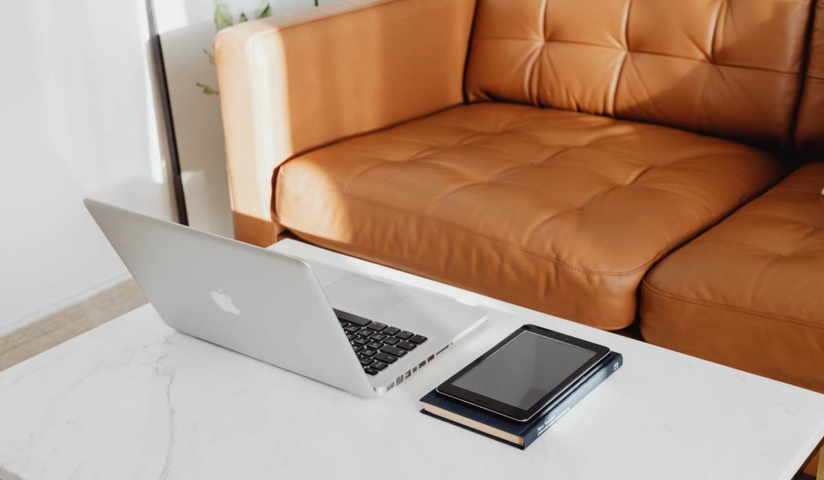 Resident working from home in their living room at Studio Park Lofts & Tower in Grand Rapids, Michigan 