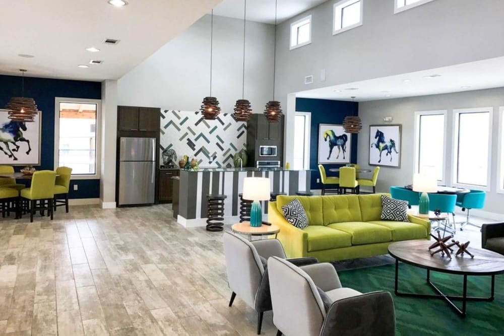 Resident clubhouse lounge and kitchen at Creekside at Kenney's Fort in Round Rock, Texas