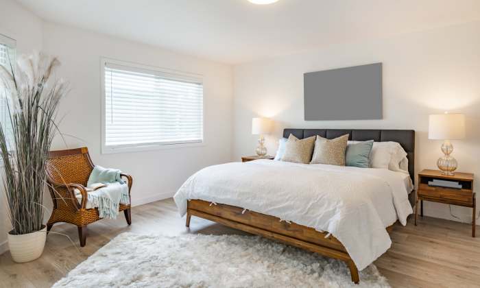 Modern bedroom with a window at The Heights at Happy Valley in Happy Valley, Oregon