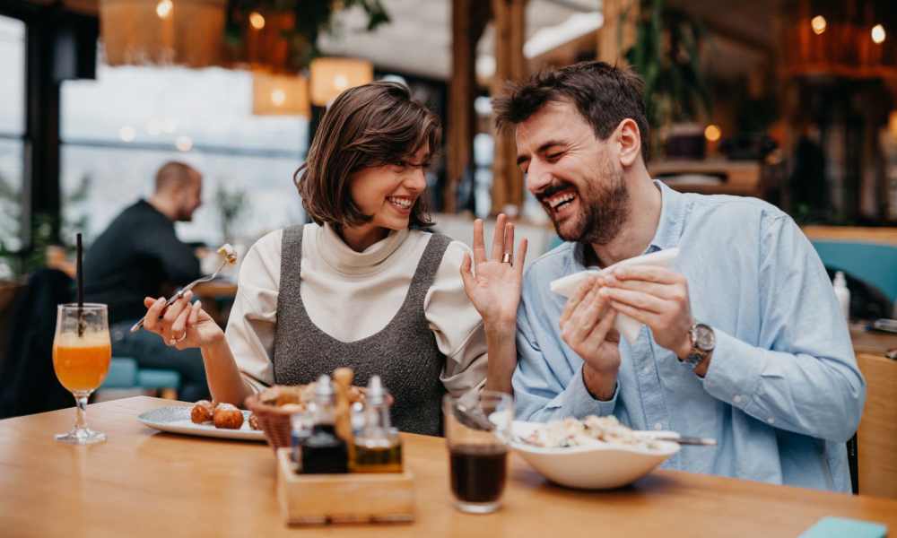 Resident couple eating at a restaurant near Steele Creek in Jacksonville, Florida