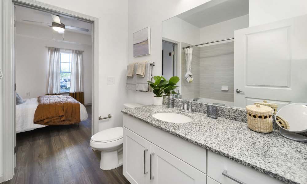 Bathroom with large vanity at The Warrick in Nashville, Tennessee