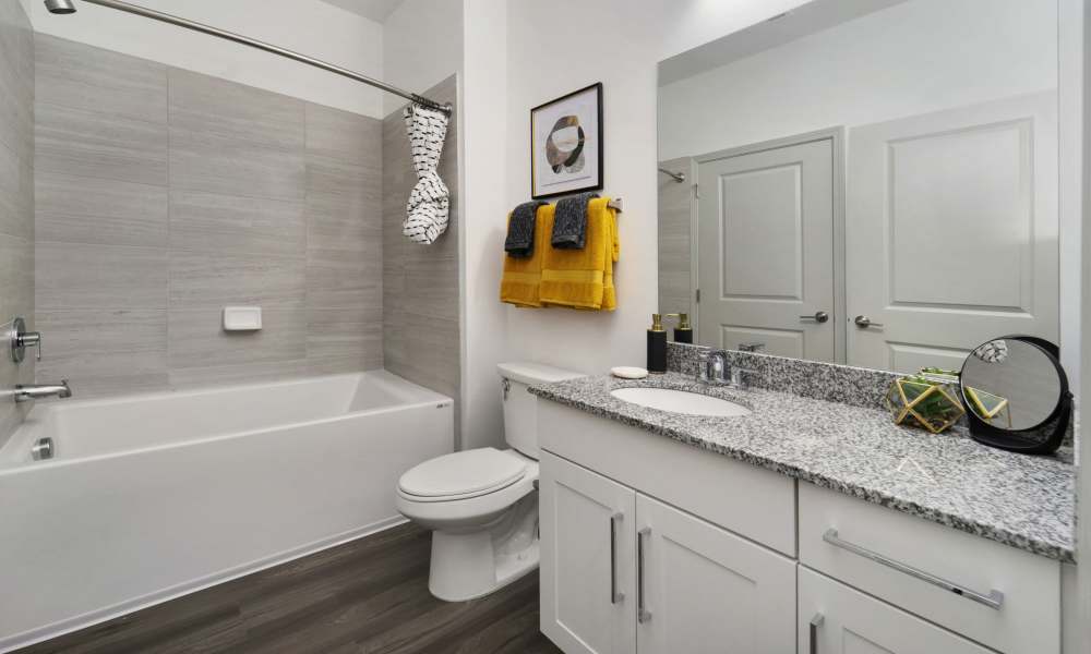 Bathroom with bathtub at The Warrick in Nashville, Tennessee