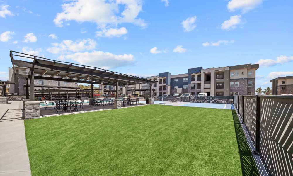 Green lush with view of patio at Retreat at Eastlake in El Paso, Texas
