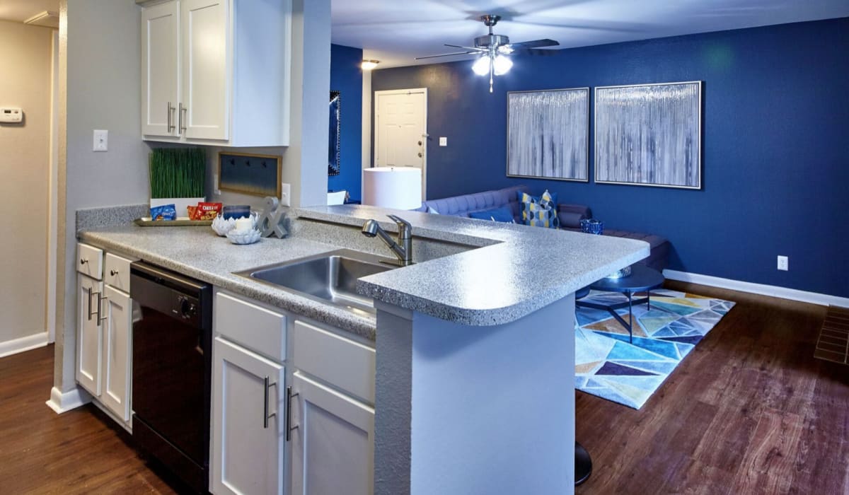 Kitchen with white appliances at South Pointe in Dallas,Texas