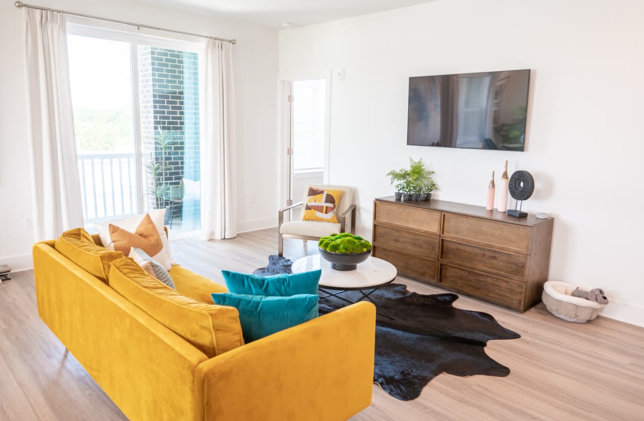 Living room with bright yellow couch