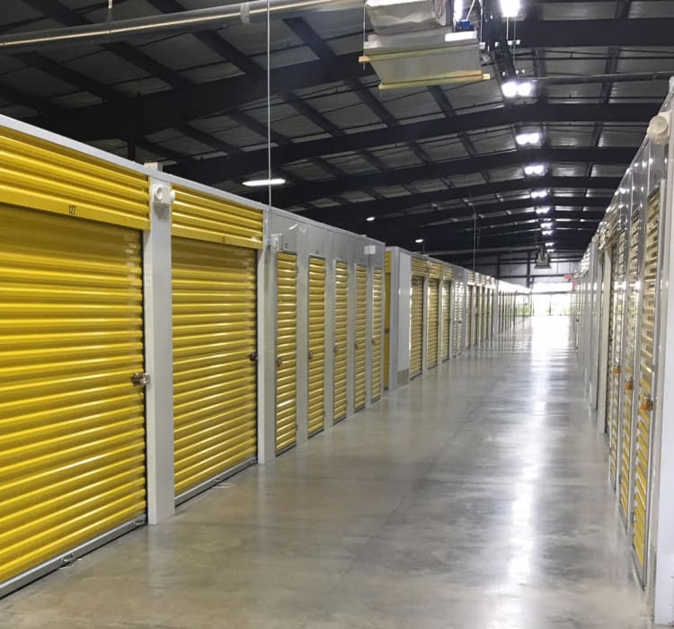 Bright and clean interior storage unit hallway at Storage Star Red Bluff in Pasadena, Texas