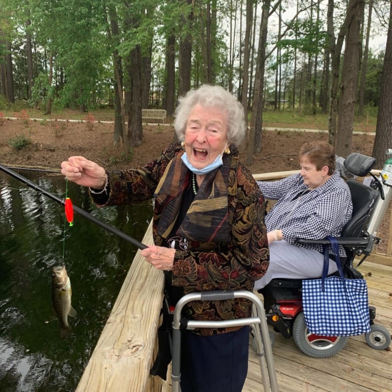 Resident who caught a fish at a Presbyterian Communities of South Carolina community