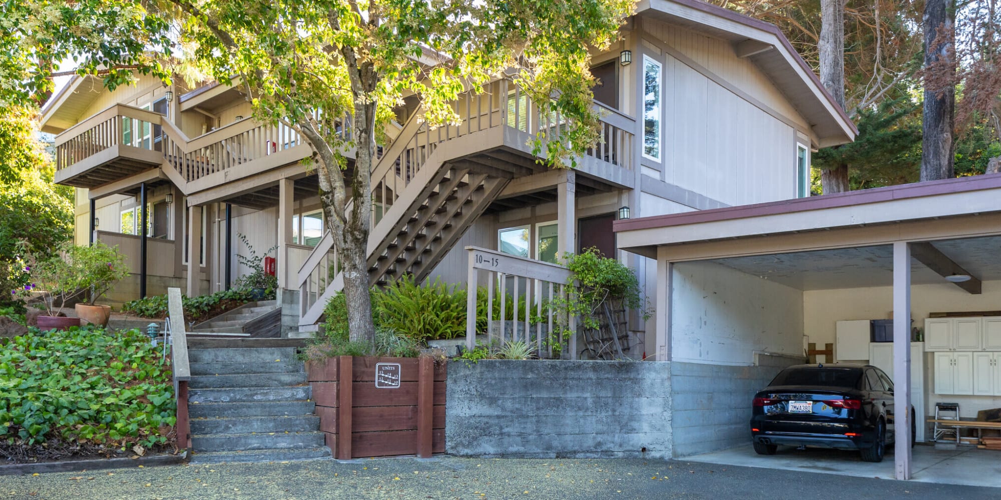 Exterior view with covered parking at  South Knoll in Mill Valley, California