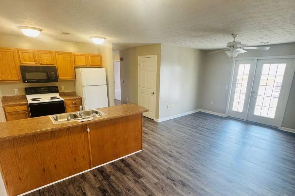 Kitchen with wooden cabinets at Gleneagles Apartments in Lexington,Kentucky