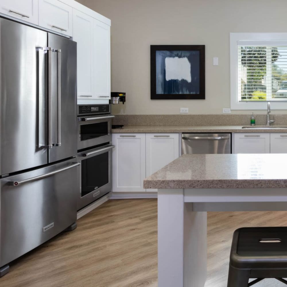 Open-concept living and kitchen at Haven at Golf Creek in Portland, Oregon