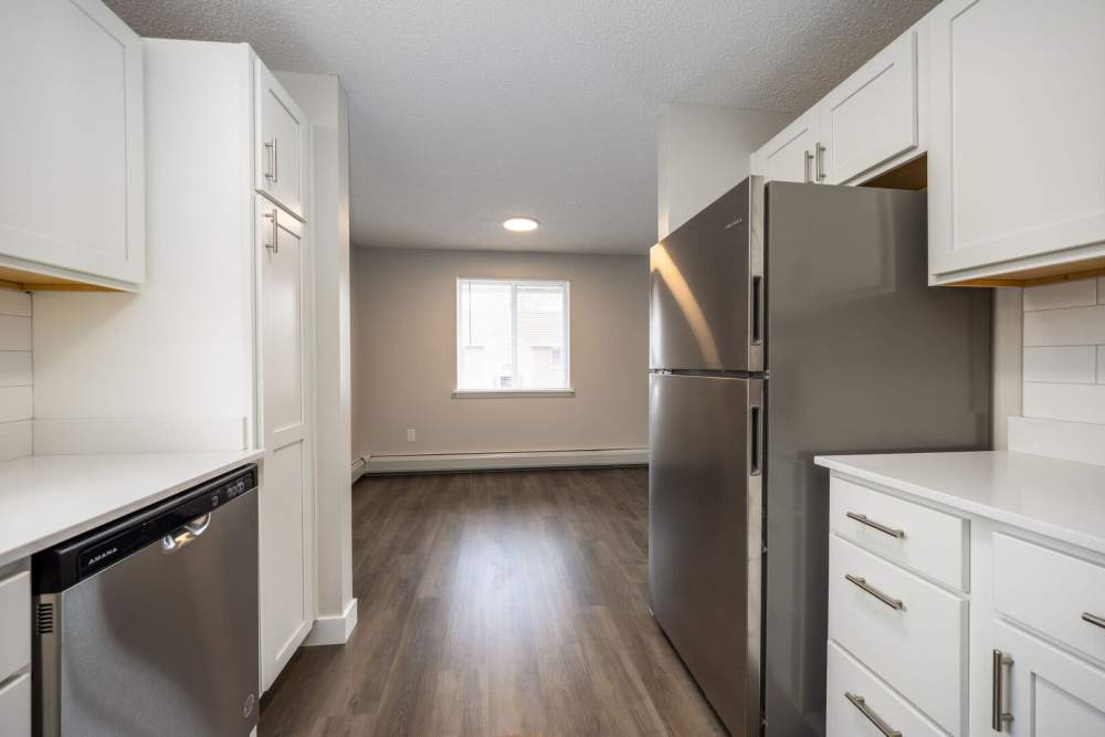 Kitchen with stainless-steel appliances at Poplar Gardens in Rochester,New York