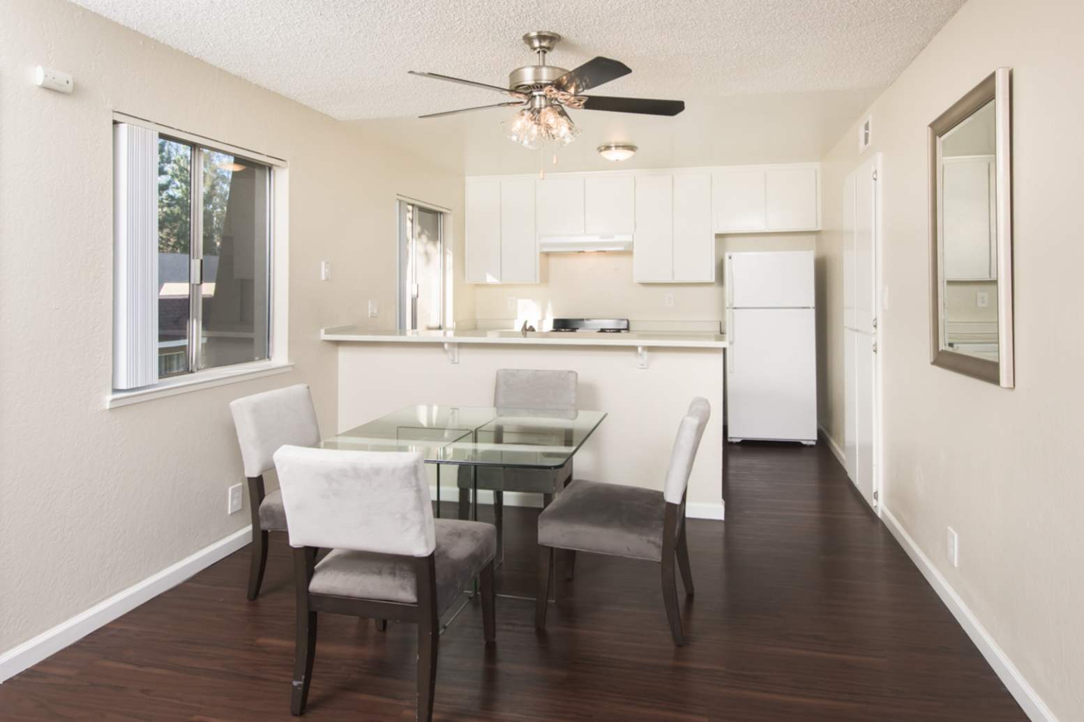 Apartment kitchen with close access to dining at Livermore Gardens in Livermore, California