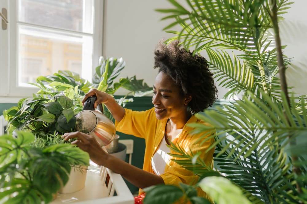 Residents trimming her plants at Pinnacle Apartments in Fife, Washington