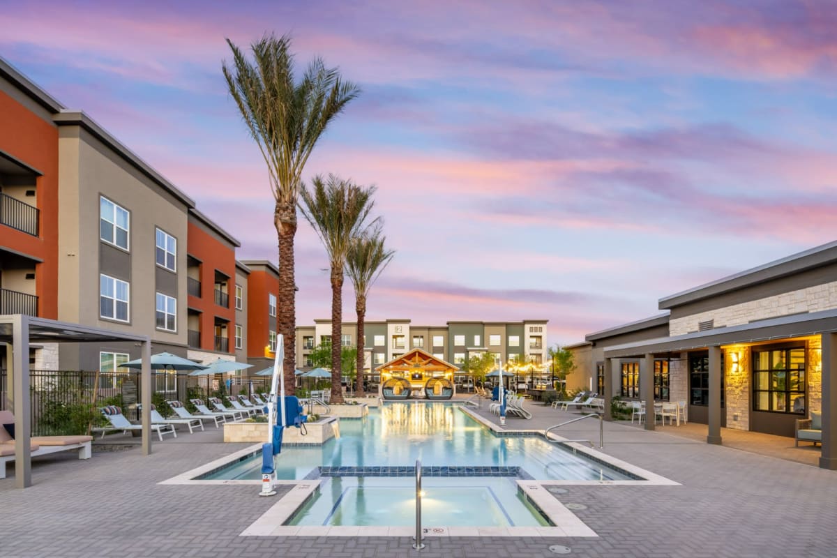 Palm tree lined pool at sunset The Wyatt, Gilbert, Arizona