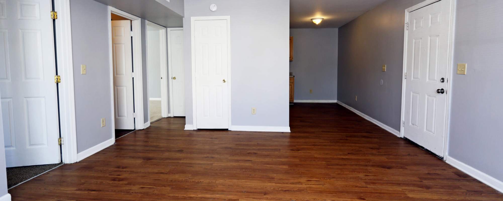 Unfurnished living room at Alston Arms Apartments in North Charleston, South Carolina