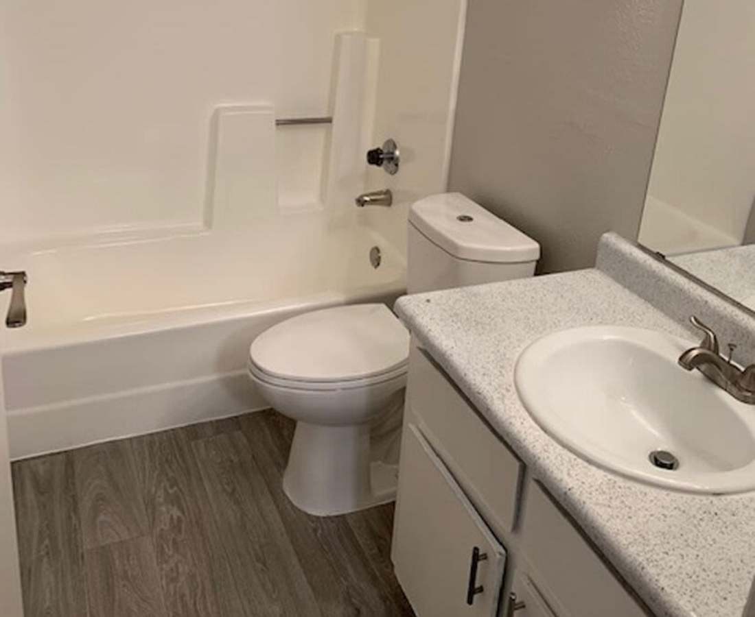 Bathroom with shower and tub at 544 Southern Apartments in Mesa, Arizona