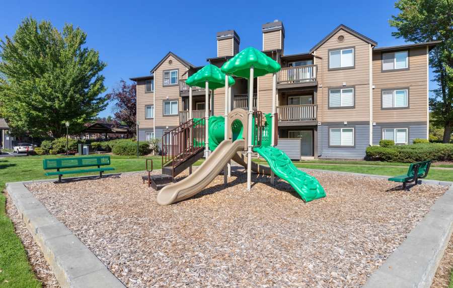 Community playground with slides and climbing area at Foundry on Fifth in Renton, Washington