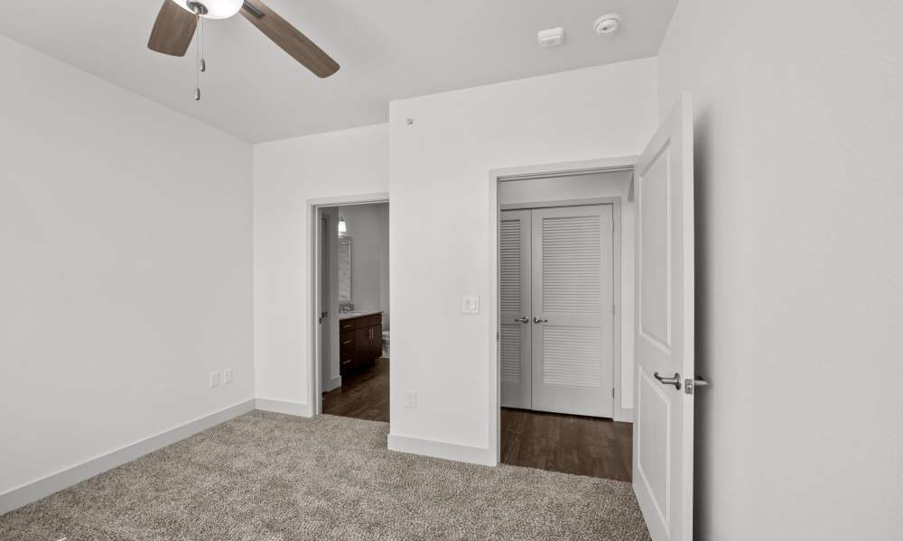 Bedroom with walk-in closet at Brook Hollow in Wichita Falls, Texas