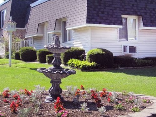 Lush landscaping at Newcastle Apartments in Rochester, New York