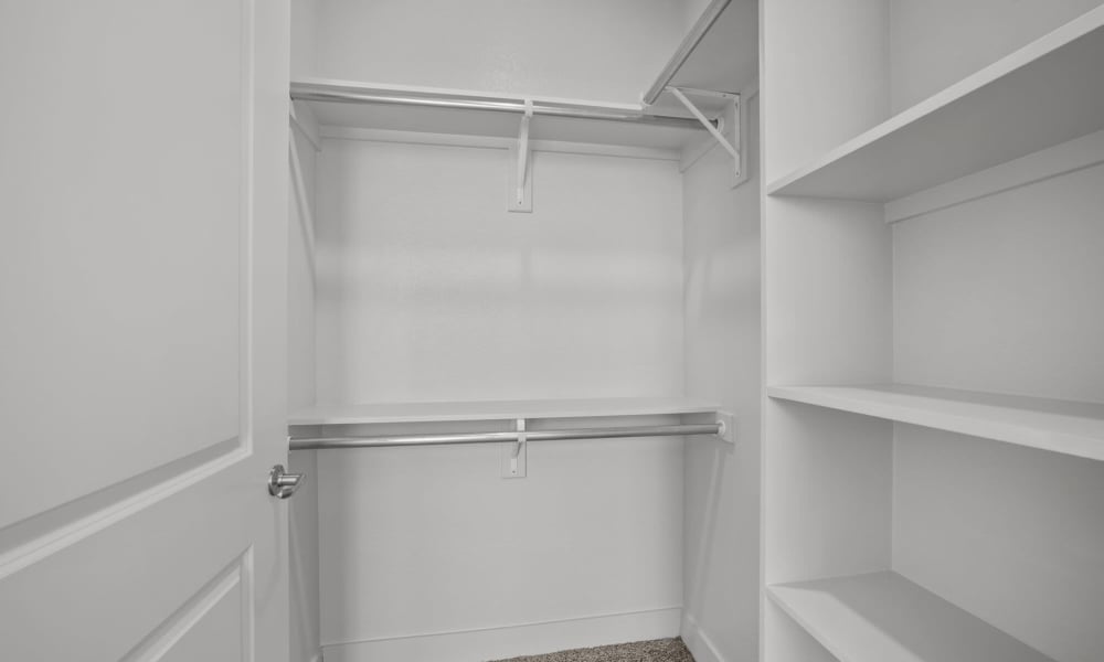 Walk-in closet attached to the bedroom at Brook Hollow in Wichita Falls, Texas