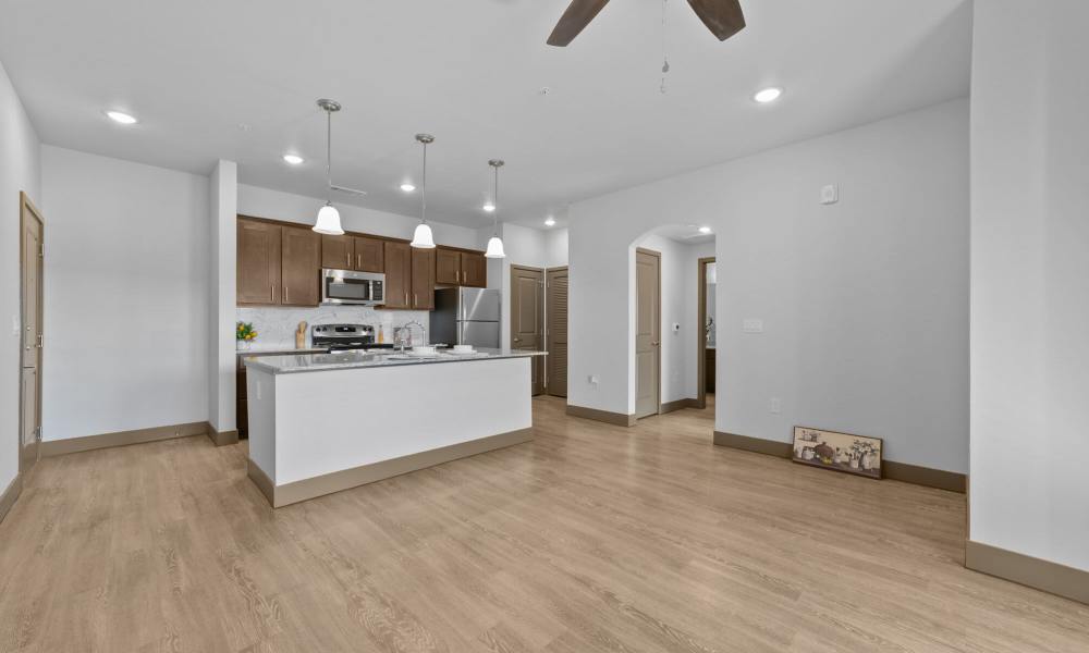 Kitchen with unburnished dining area at Deer Park in Athens, Texas 