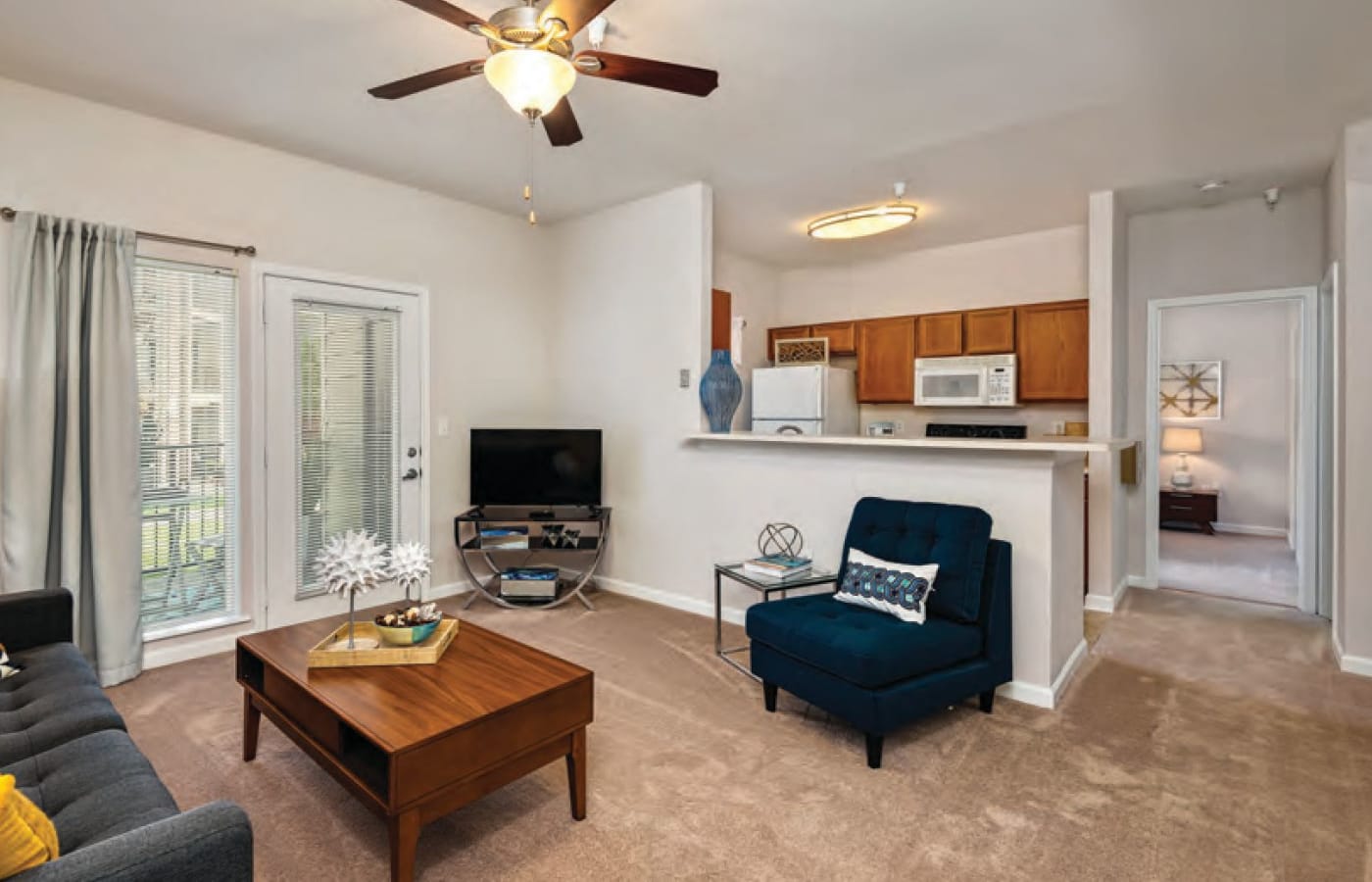 Spacious living rooms at Cornerstone Apartments in Independence, Missouri.