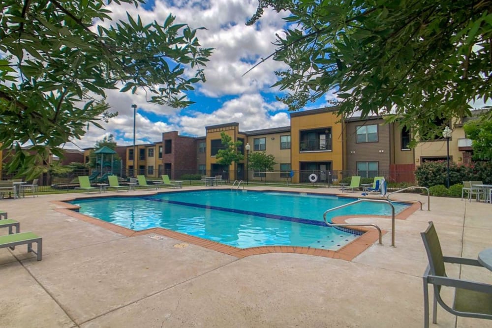 View of the spacious pool and lounge seating at The BLVD in San Angelo, Texas