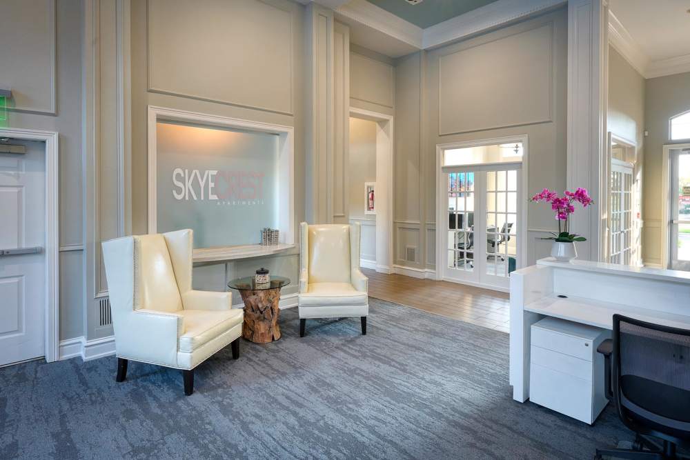 Seating area at the reception at Skyecrest Apartments in Lakewood, Colorado