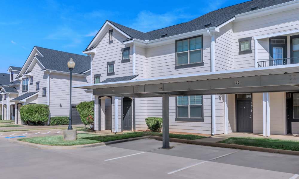 Exterior view of apartment with parking space at Burkburnett Residences in Burkburnett, Texas