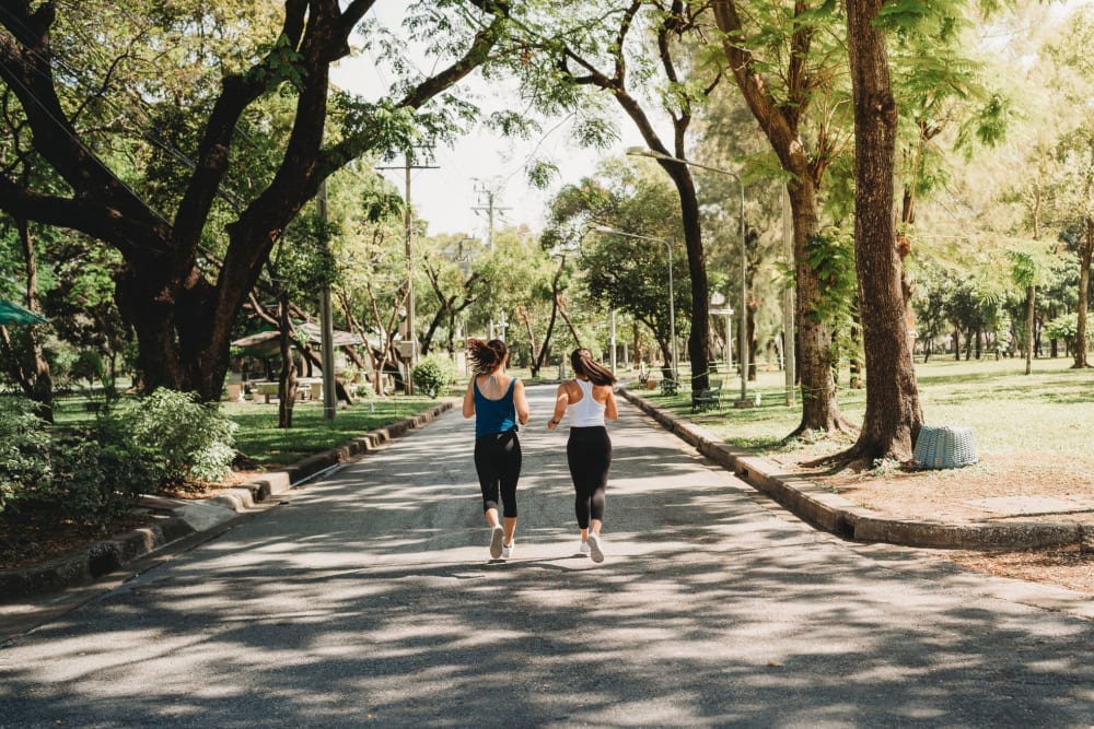 Residents enjoying a jog at Bull Run Apartments in Miami Lakes, Florida