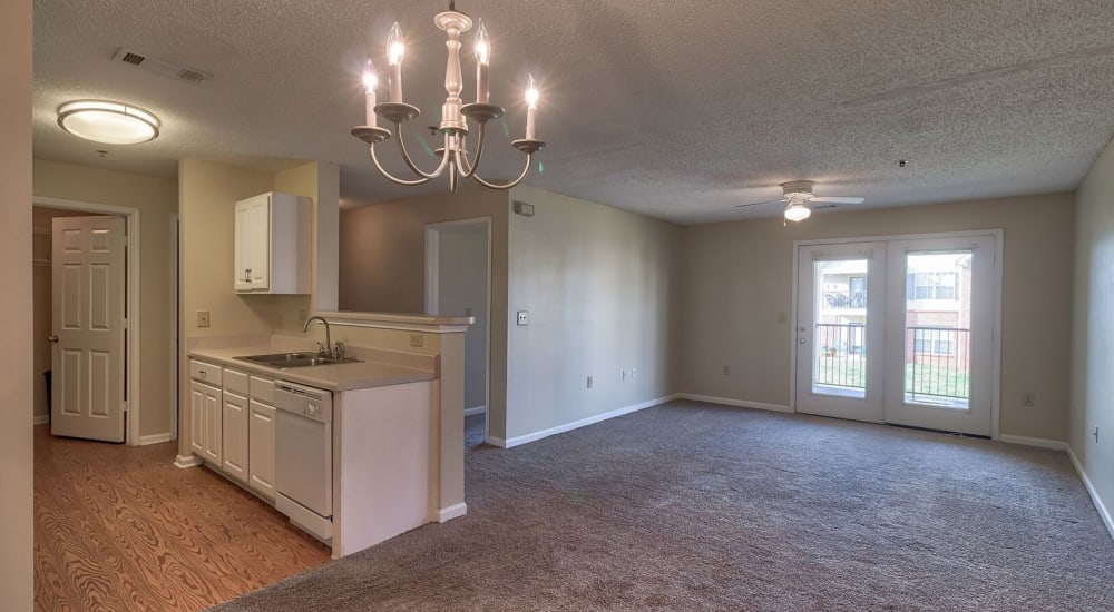 Spacious apartment with polished wood-style flooring at Chapel Lakes in Wetumpka, Alabama