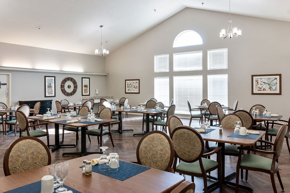 dining area with large windows and natural light at Cimarron Place in Midland, Texas