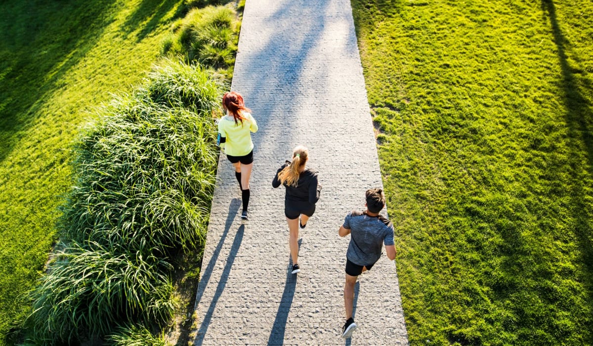 Residents run on a trail near The Collection at American Tobacco Center, Richmond, Virginia