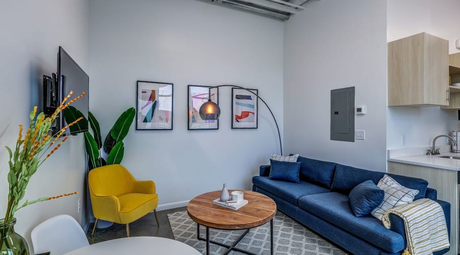 Modern living area at University Lofts at Greensborough Village, Jonesboro, Arkansas