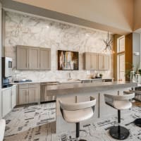 Open Kitchen with cabinet at Discovery at Craig Ranch in McKinney, Texas