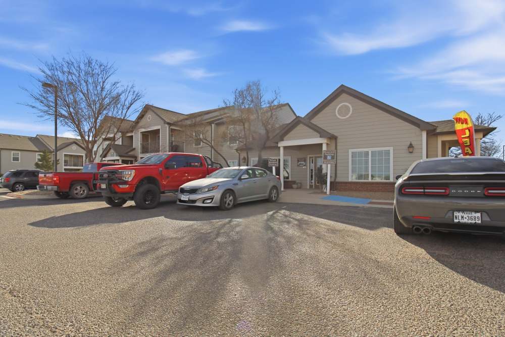 Cars parked in front the building at Dunes Apartments in Seminole, Texas