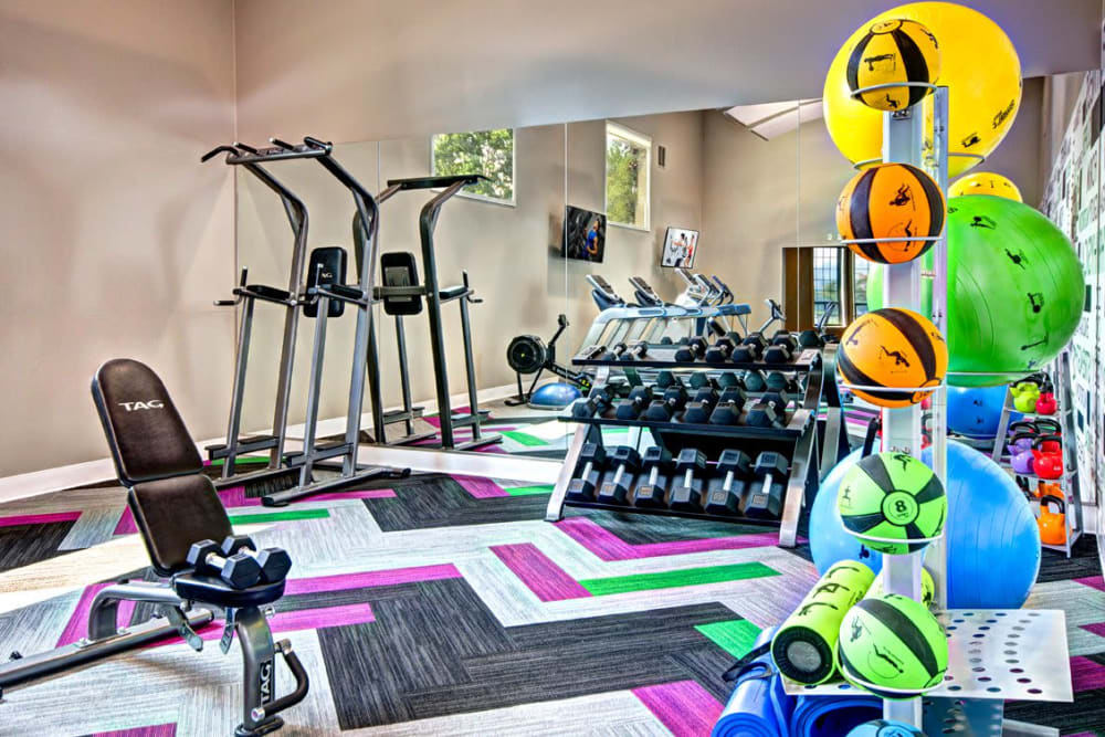 The fully equipped fitness center at Wellington Apartment Homes in Silverdale, Washington